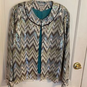 Get ready to Sparkle with this sequin jacket by Chico’s